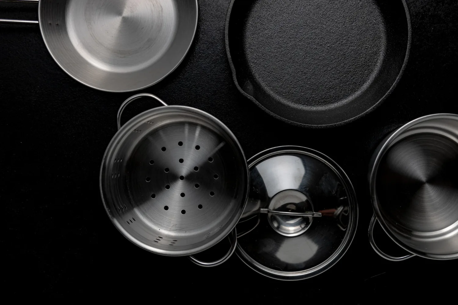 Flat lay of a complete TIFLI cookware set